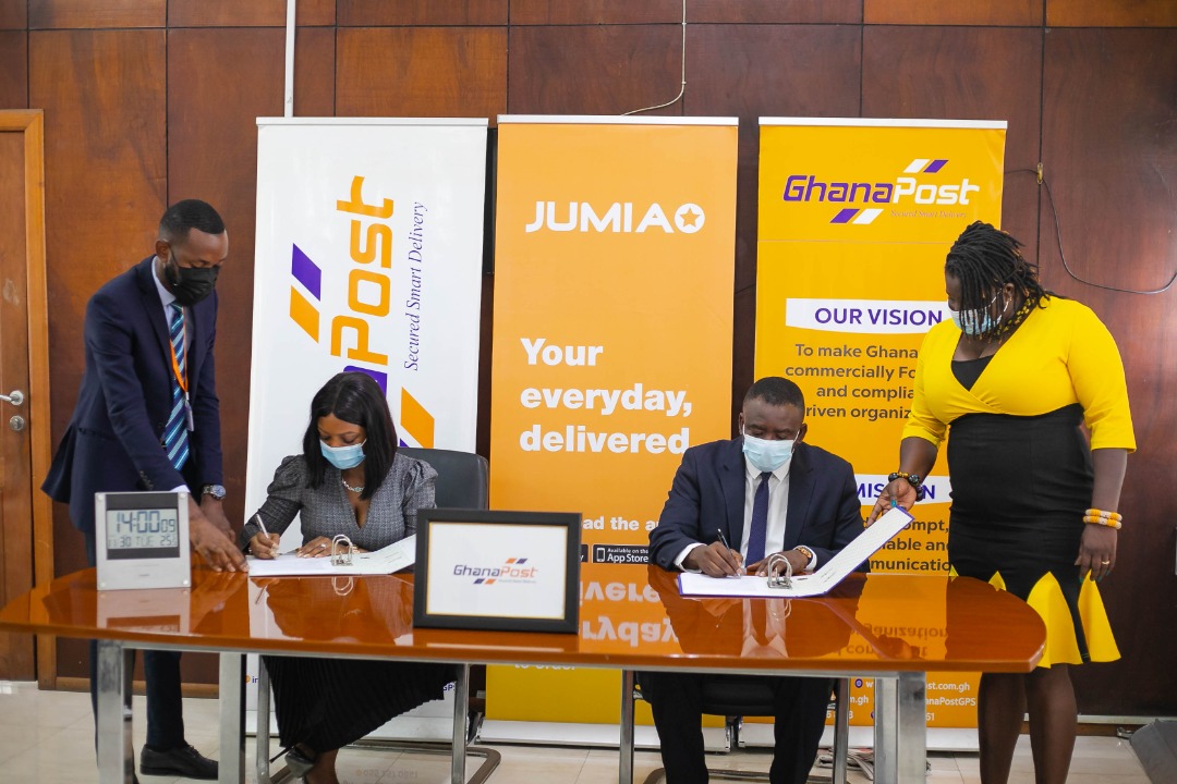 Deputy MD of Ghana Post and CEO of Jumia Ghana signing the partnership agreements
